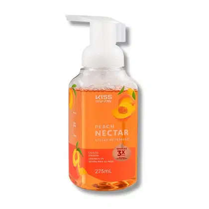 Frasco de espuma de sabonete líquido da marca Kiss New York, com rótulo laranja e texto "Peach Nectar", contendo 275 ml do produto.