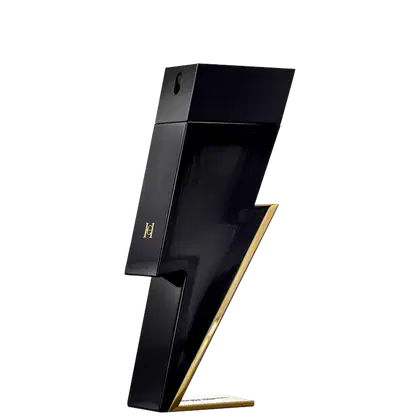 Frasco de perfume preto e dourado Bad Boy da Carolina Herrera, com design em formato de raio