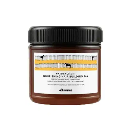 Frasco de cabelo da marca Davines, com rótulo branco e preto, contendo um produto para reconstrução e nutrição de cabelos secos e danificados, com ingredientes naturais.