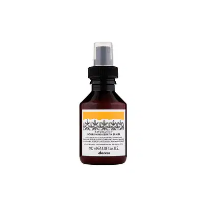 Frasco de 100 ml de um selador nutritivo de queratina da marca Davines, com rótulo em tons de laranja e preto, contendo informações sobre o produto.