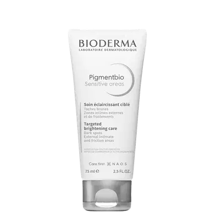 Frasco branco de 75 ml da linha Pigmentbio da Bioderma, com rótulo em preto e cinza indicando "Sensitive areas" e "Targeted brightening care" para áreas escuras e de atrito.