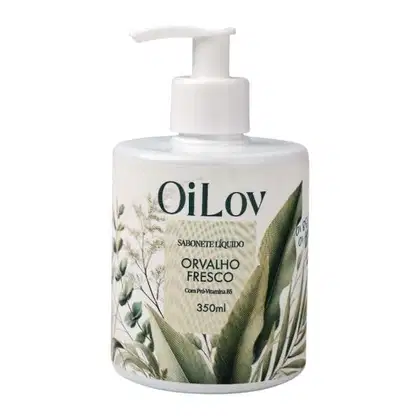 Frasco de sabonete líquido OiLov com rótulo em branco e verde, contendo 350ml do produto "Orvalho Fresco" com pró-vitamina B5. Embalagem com design minimalista e ilustrações de folhas.