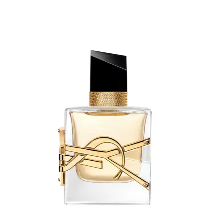 Frasco de perfume Yves Saint Laurent com design elegante e moderno. Embalagem de vidro transparente com detalhes dourados, incluindo tampa e estrutura metálica. Rótulo preto com logotipo da marca em destaque.