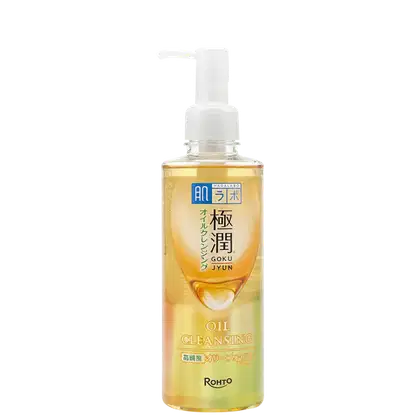 Frasco de limpeza facial em óleo da marca Rohto, com bomba dosadora, em embalagem de vidro transparente com rótulo azul e amarelo. O produto é chamado de "Hada Labo Gokujyun Cleansing Oil".