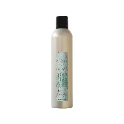 Frasco de produto de beleza Davines com design minimalista e rótulo com ilustrações florais em tons de verde e vermelho. Embalagem cilíndrica com tampa preta.