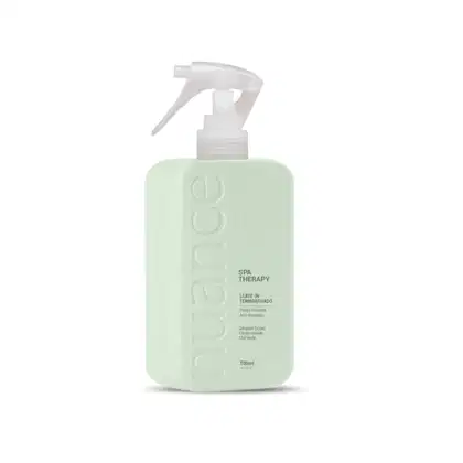 Spray leave-in da linha Spa Therapy da marca Nuance Professional. O frasco possui um gatilho pulverizador branco na parte superior. O produto é descrito como um tratamento para cabelos, com a função de deixá-los hidratados.