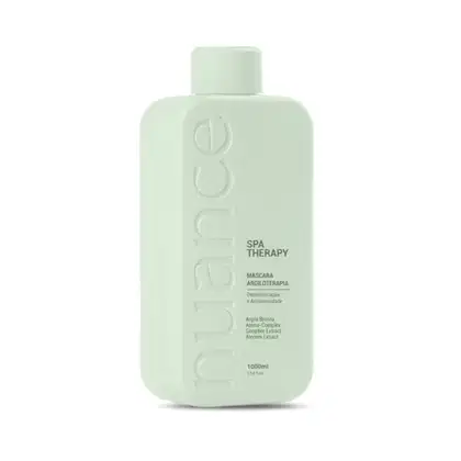 Máscara de argila da linha Spa Therapy da marca Nuance Professional.  O frasco possui um design simples e minimalista, com uma tampa branca na parte superior.