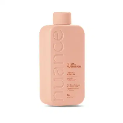 Máscara nutritiva da linha Ritual Nutrition da marca Nuance. A embalagem é um frasco plástico de cor rosa claro, com o nome da marca e do produto impressos em relevo. O frasco possui um formato cilíndrico e contém 1kg do produto.