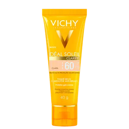 Tubo de protetor solar em gel-creme da linha Ideal Soleil da Vichy, com FPS 60 e embalagem amarela e branca. O produto promete alta proteção solar diária e uniformidade da pele.