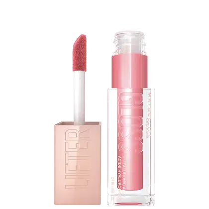 Produto de maquiagem Maybelline com embalagem rosa e branca, contendo um aplicador de batom com textura aveludada e cor rosa vibrante.