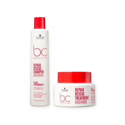Dois produtos da linha Bonacure da Schwarzkopf Professional: um frasco branco com tampa vermelha contendo Shampoo Repair Rescue Arginine e um pote branco com tampa vermelha contendo Tratamento Repair Rescue Arginine.