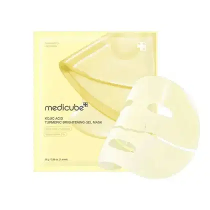 Máscara facial em gel de brilho com ácido kójico e cúrcuma da marca Medicube, em embalagem amarela e branca com texto informativo.