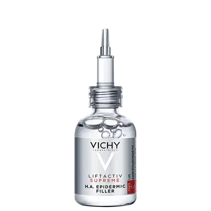 Frasco de vidro transparente com pipeta dosadora contendo o produto Liftactiv Supreme H.A. Epidermic Filler da Vichy. O rótulo apresenta o nome da marca e do produto em letras brancas sobre fundo preto.
