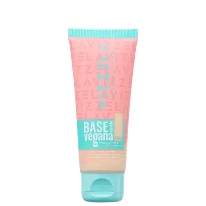 Tubo de base vegana de maquiagem com acabamento aveludado, em embalagem rosa e azul-turquesa, com rótulo indicando que é livre de crueldade e parabenos.