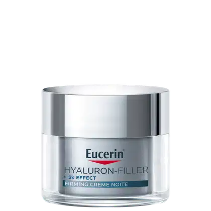 Frasco de creme facial noturno da marca Eucerin, com tampa prateada, rótulo branco e azul, contendo texto "Hyaluron-Filler + 3x Effect Firming Creme Noite".