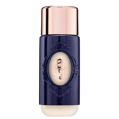 Frasco de base BT Skin da marca Bruna Tavares, com design elegante e sofisticado. Embalagem em tom azul marinho com detalhes em dourado, contendo um rótulo oval com o nome da marca.