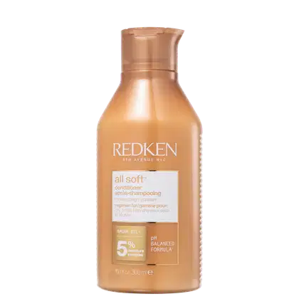 Frasco de condicionador Redken All Soft, com embalagem em tons de laranja e branco, contendo 300 ml do produto. O rótulo destaca o nome da marca, a linha "All Soft" e informações sobre a fórmula balanceada de pH e o complexo de 5% de umidade.