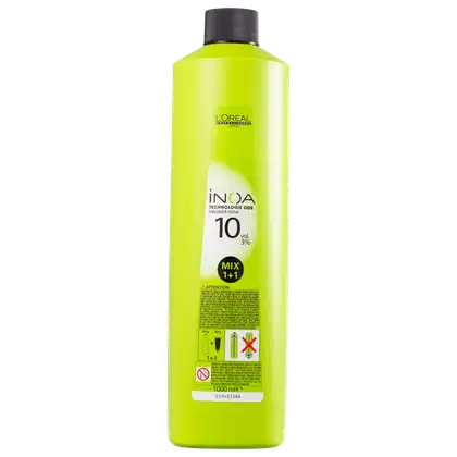 Frasco de produto de cabelo da marca L'Oréal Inoa, com 1000 ml de volume, em embalagem de plástico de cor verde-limão predominante, com rótulo indicando tecnologia oxidante e nível de volume de 10 vol.