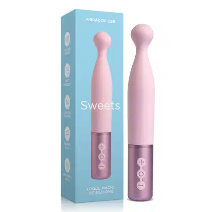 Vibrador USB feito de silicone. Possui um design cilíndrico de cor rosa claro e vem acondicionado em uma caixa de cor azul clara com o nome da marca e informações sobre o produto. Possui controles integrados e é resistente à água.