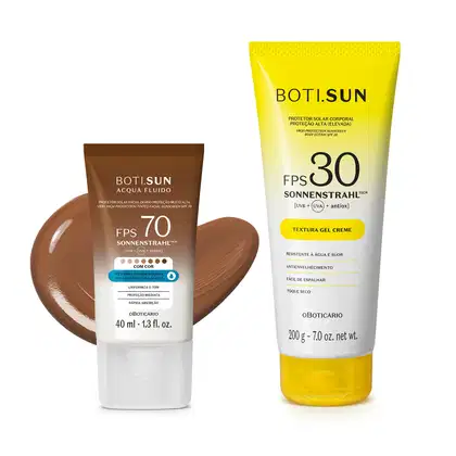 Dois produtos de proteção solar da marca Boti Sun: um frasco de protetor solar facial FPS 70 Cor 07 em bisnaga marrom e branca e uma frasco protetor solar corporal FPS 30 em bisnaga amarela e branca com tampa amarela.