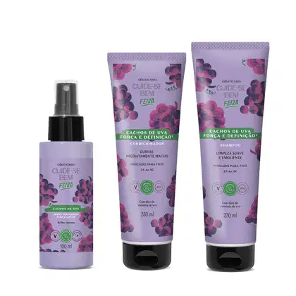 Imagem de três produtos da marca Cuide-se Bem Feira Cachos de Uva: frasco de spray para cabelos, bisnaga de condicionador e bisnaga de shampoo, todos com embalagens roxas com estampa de cachos de uva.