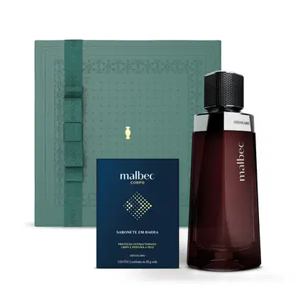 Imagem de uma caixa de presente verde escura com detalhe dourado, um vidro na cor vinho e tampa preta de desodorante colônia Malbec e uma caixa de sabonete em barra na cor azul escura com detalhes cinza.