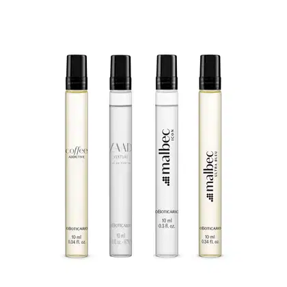 Quatro frascos de perfumaria masculina transparentes com tampa preta de 10 ml cada, sendo um Malbec Ultra Bleu Desodorante Colônia, um Coffee Addictive Man Desodorante Colônia, um Zaad Venture Eau de Parfum e um Malbec Icon Desodorante Colônia.


