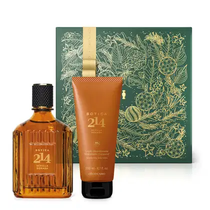 Imagem do Combo Botica 214 Sevilla Dorada que traz um vidro de Eau de Parfum Fougére Aromático, bisnaga de loção hidratante corporal, ambas em embalagem marrom e tampa preta, e caixa verde decorada com ilustrações florais douradas.