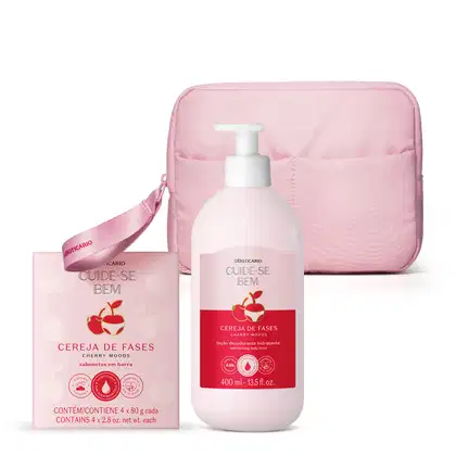 Imagem de um kit contendo três produtos da linha Cuide-se Bem Cereja De Fases, que traz quatro sabonetes em barra, frasco de loção corporal de 400ml  uma linda nécessaire rosa. As embalagens são delicadas, em tons de rosa com cereja ilustrativa.