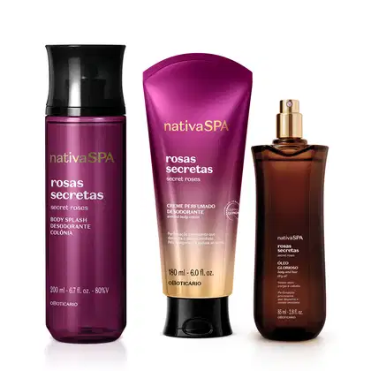 Imagem mostra um kit de produtos Nativa SPA Rosas Secretas, Ele possui um frasco roxo de body splash com tampa preta, uma bisnaga de creme desodorante com um degradê do roxo para o branco e um vidro roxo de óleo para corpo e cabelo com borrifador dourado.
