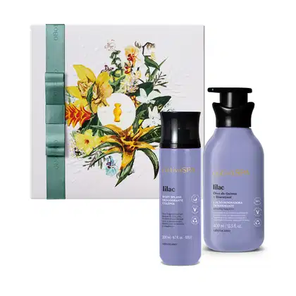 A imagem mostra uma caixa de presente com ilustração floral, um frasco do body splash Nativa SPA Lilac e uma embalagem de 400ml da loção desodorante da mesma marca. Ambos os produtos são na cor lilás com tampa preta e rótulo com letras brancas e pretas.