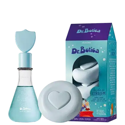 Conjunto Dr. Botica com frasco de poção de coragem em vidro azul-turquesa, sabonete em barra espumosa branco em formato de coração e embalagem caixa turquesa com detalhes roxos. Produtos infantis testados dermatologicamente.