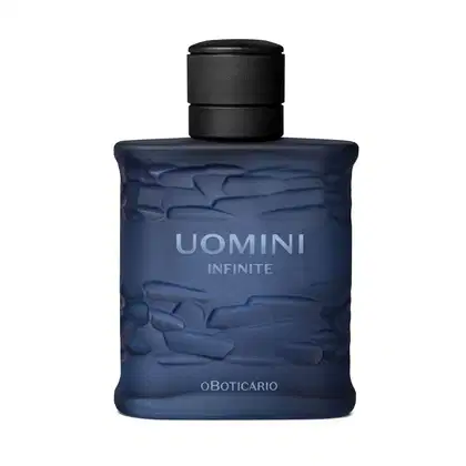 Frasco retangular azul marinho com texturas onduladas, tampa preta e letras com degradê em tons de azul, contendo 100ml de desodorante colônia da marca Uomini Infinite.