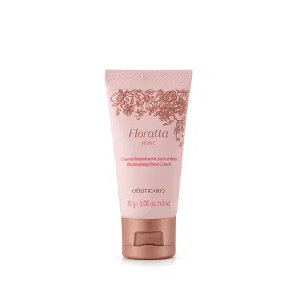 Bisnaga na cor rosa claro com detalhes florais e tampa na cor dourada contendo 30g de creme hidratante para as mãos Floratta Rose.