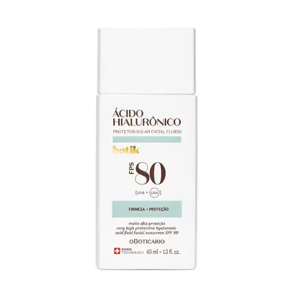 Frasco branco com letras pretas e detalhes em azul, laranja e vermelho contendo 40ml de protetor solar facial fluído FPS 80 da marca Botik Ácido Hialurônico.
