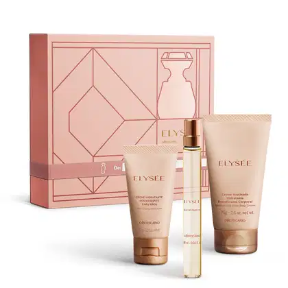 Imagem do kit de presente Elysée, que traz um vidro cilíndrico com 10ml de Eau de Parfum, uma bisnaga rosa com creme hidratante para as mãos, outra na mesma cor de loção hidratante corporal, e uma caixa para presente na cor rosa com desenhos geométricos.