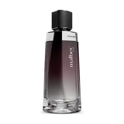 A embalagem tem um design moderno e elegante. O topo metálico preto texturizado traz um padrão geométrico sofisticado. A frente do frasco apresenta o nome da fragrância "Malbec" em letras minúsculas, seguido do logotipo "O Boticário".