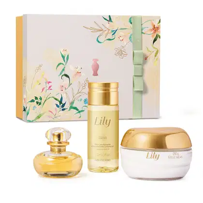 Caixa amarela com tampa branca e ilustração de flores e folhagens coloridas, acompanhada de três itens da marca Lily em tons de bege, dourado e branco, incluindo Eau de Parfum, óleo perfumado corporal e creme acetinado corporal.