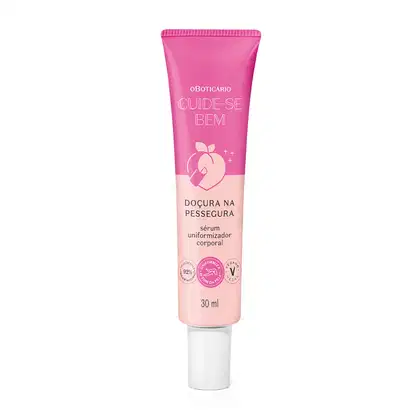 O produto apresentado é um sérum uniformizador corporal. A embalagem é um tubo de cor rosa com o nome da linha e do produto impresso. O produto é descrito como um sérum para a pele, com a promessa de uniformizar a aparência corporal.