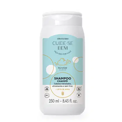 Imagem de um frasco branco de shampoo da marca Cuide-se Bem Nuvem, com rótulo em tons de azul e círculos amarelos, contendo a descrição e informações sobre o produto para cabelos hidratados e sem frizz em letras pretas.