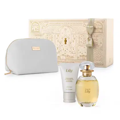 Caixa de presente bege com detalhes dourados, nécessaire azul, vidro com líquido amarelo com tampa dourada de L`eau De Lily e bisnaga branca com tampa cinza de creme de mãos acetinado da marca Lily.