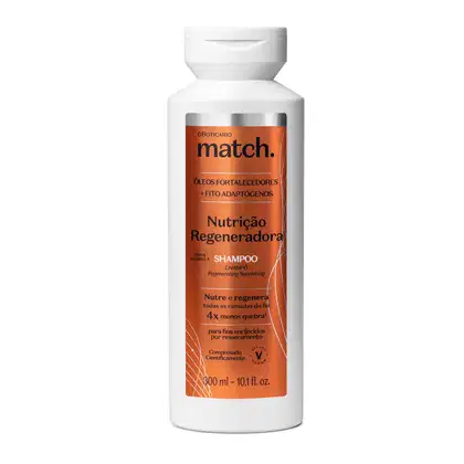 Frasco branco de shampoo da marca Match Nutrição Regeneradora, com rótulo laranja e informações sobre óleos fortalecedores e fito adaptógenos em letras brancas e pretas. Também há detalhes em dourado e a tampa do produto é branca.