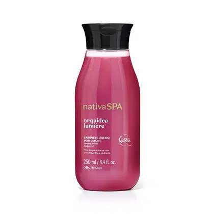 Frasco de sabonete líquido perfumado da marca Nativa SPA Orquídea Lumière na cor rosa vibrante e tampa preta com informações sobre o produto escritas em branco no rótulo.