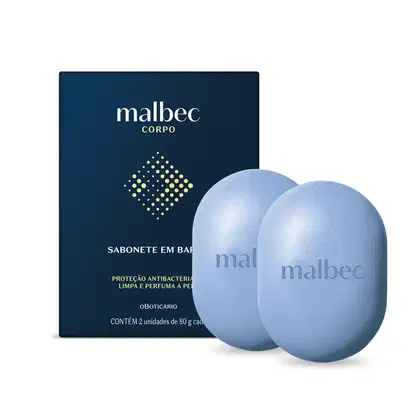 Imagem de uma caixa azul-marinho com logotipo Malbec Corpo e dois sabonetes em barra de cor azul-claro com logotipo Malbec, embalados em caixa com informações sobre proteção antibacteriana e perfumação.
