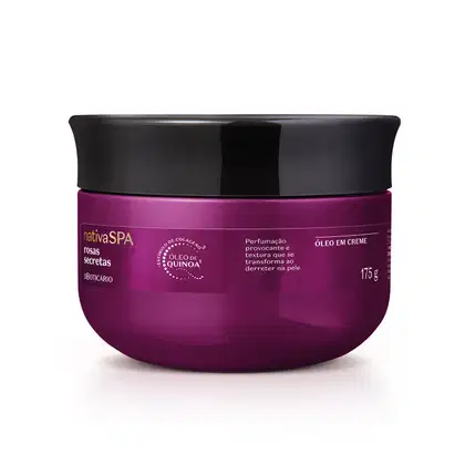 A imagem mostra um pote de óleo em creme da linha Nativa SPA Roas Secretas. A embalagem é toda roxa com tampa preta e informações sobre o produto impressas em letras brancas.