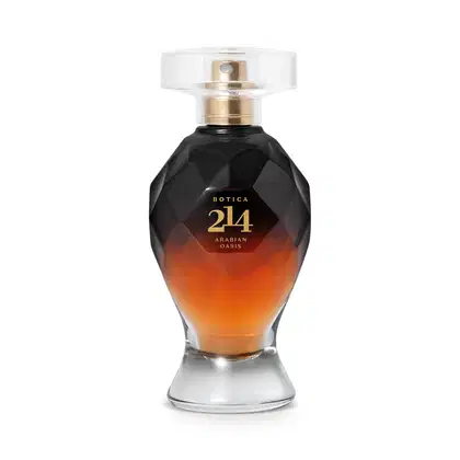 Frasco de perfume Botica 214 Arabian Oasis, com design geométrico em preto e laranja, tampa dourada e rótulo com nome da fragrância em letras douradas.