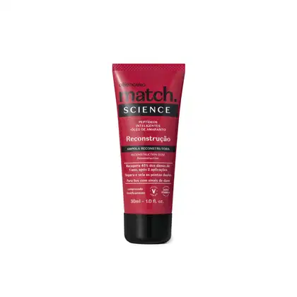 Imagem de uma bisnaga vermelha com rótulo da marca Match Science, contendo informações sobre produto reconstrutor para cabelos.