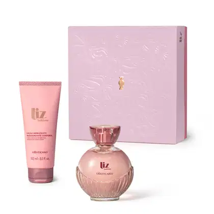 Caixa lilás com detalhe dourado e dois produtos da marca Liz: bisnaga em tons de rosa de loção hidratante corporal da linha Sublime e vidro arredondado com líquido rosa e tampa dourada de desodorante colônia.