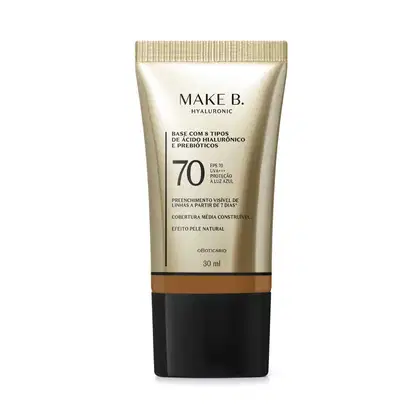 Frasco de base com 8 tipos de ácido hialurônico e probióticos da marca Make B., com FPS 70, UVA+++ e proteção à luz azul. Embalagem em tons de bege e preto, com informações sobre o produto.