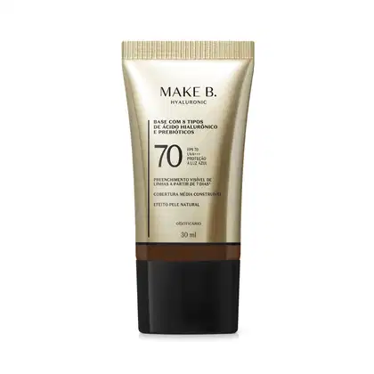 Frasco de base com 8 tipos de ácido hialurônico e probióticos da marca Make B., com FPS 70, UVA+++ e proteção à luz azul. Embalagem em tons de bege e preto, com informações sobre o produto.